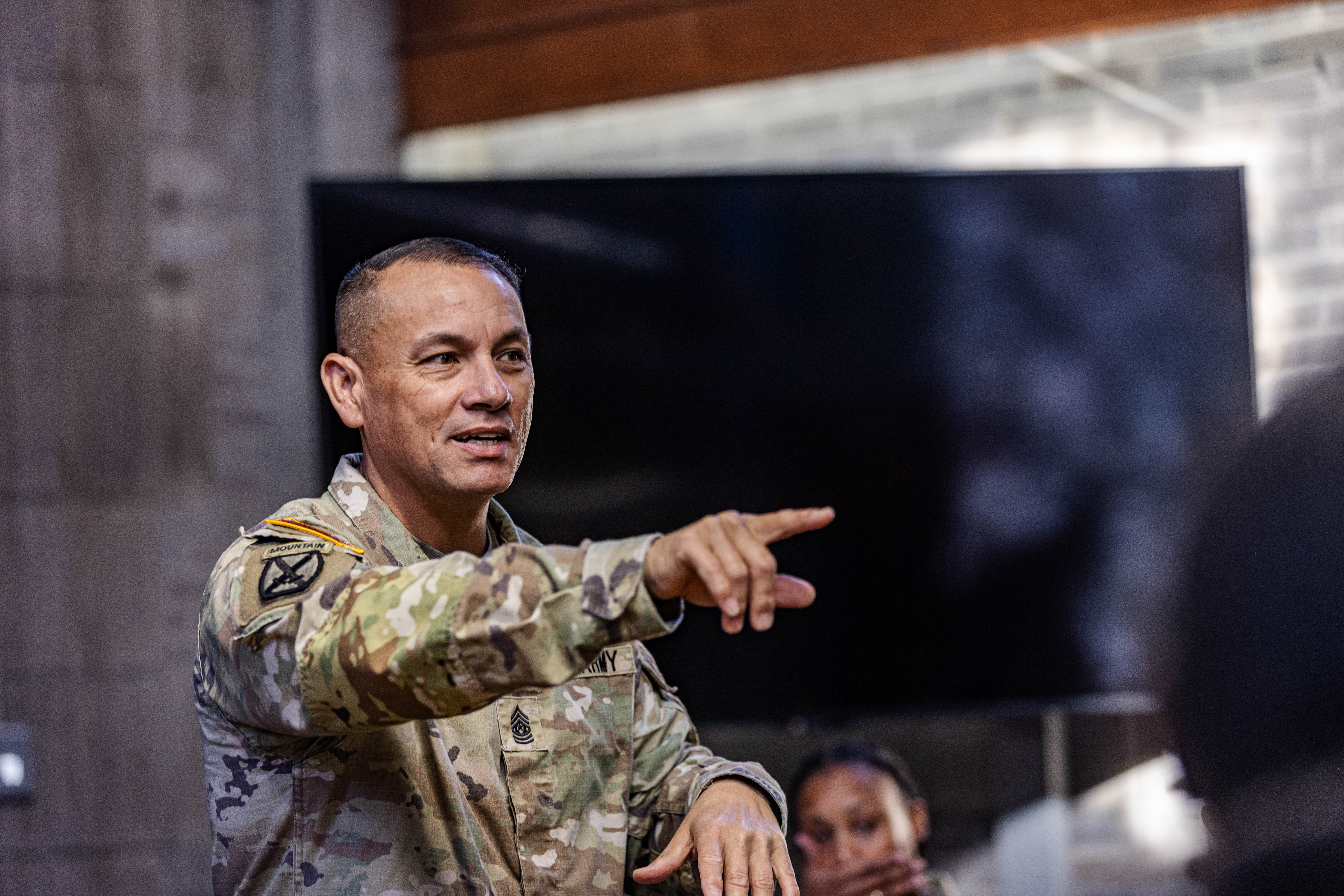 Command Sgt. Maj. Phil Barretto, the USMA command sergeant major, engaged in discussion with nine Soldiers from the 11th Airborne Division about enrolling at West Point and the plethora of opportunities that come with the 47-month experience.