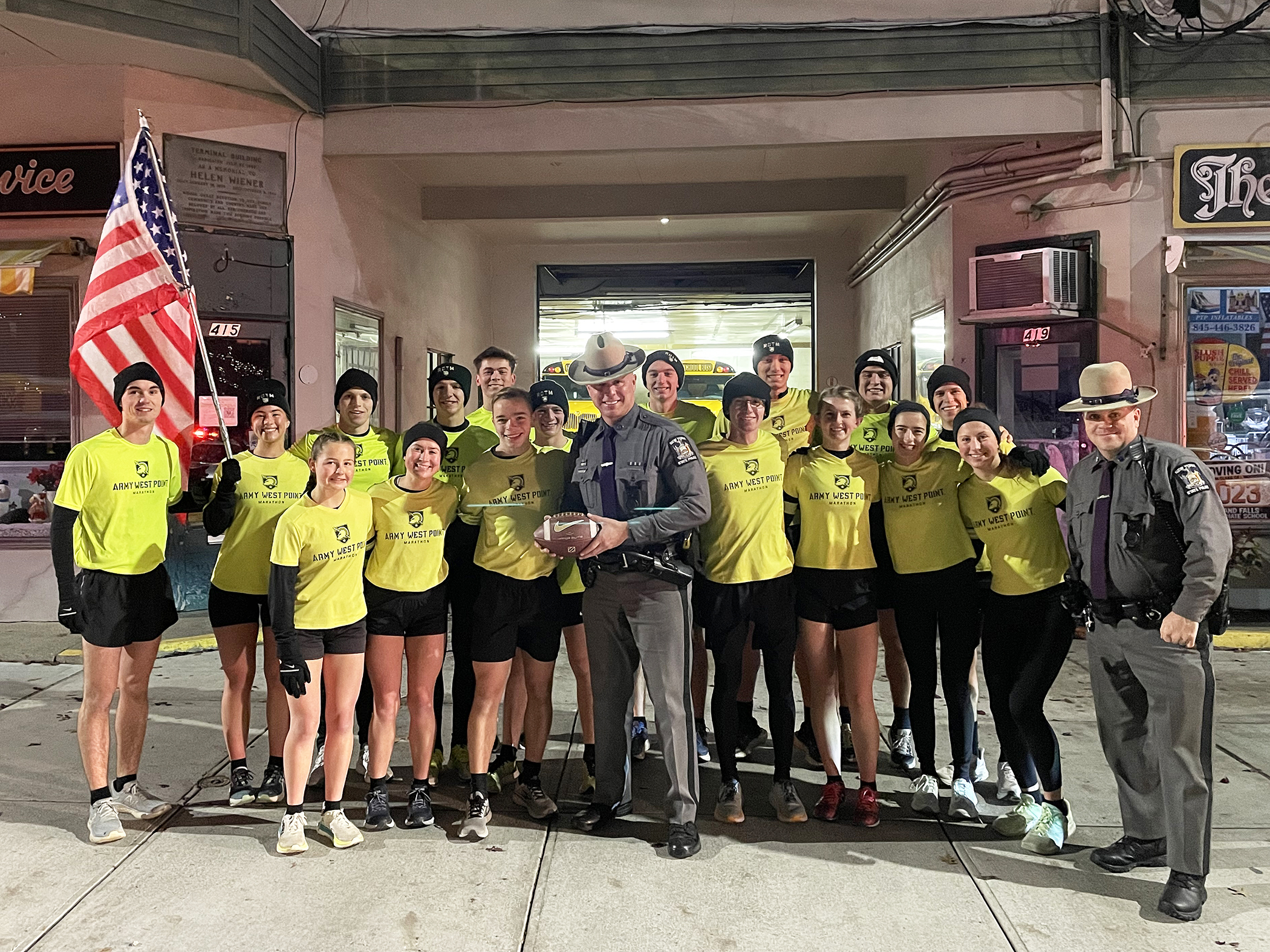 The approximately 300-mile journey of the Army-Navy Ball Run begins Wednesday, Dec. 11, in front of Quarters 100 of U.S. Military Academy Superintendent Lt. Gen. Steven Gilland’s home. Eighteen members of the Army West Point Marathon Team will step off to cheers from the West Point community and Corps of Cadets to deliver the Army-Navy gameday ball to Northwest Stadium, home of the NFL’s Washington Commanders, in Landover, Md., on Saturday, Dec. 14, for the 125th iteration of the Army-Navy Game.  (Photo cou