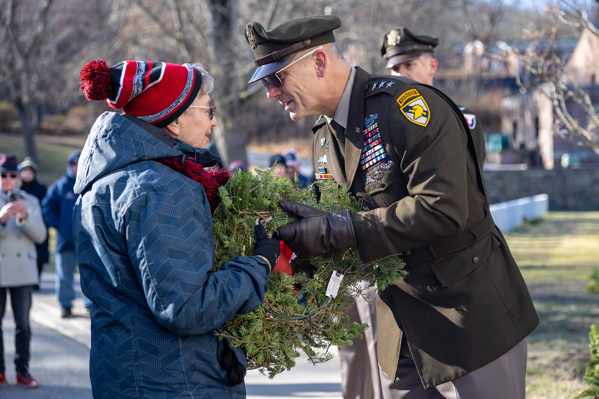 Several hundred volunteers took part in placing 7,350 wreaths throughout the West Point Cemetery during the 15th annual Wreaths Across America on Dec. 7.  (Photo by Eric S. Bartelt/USMA PAO)