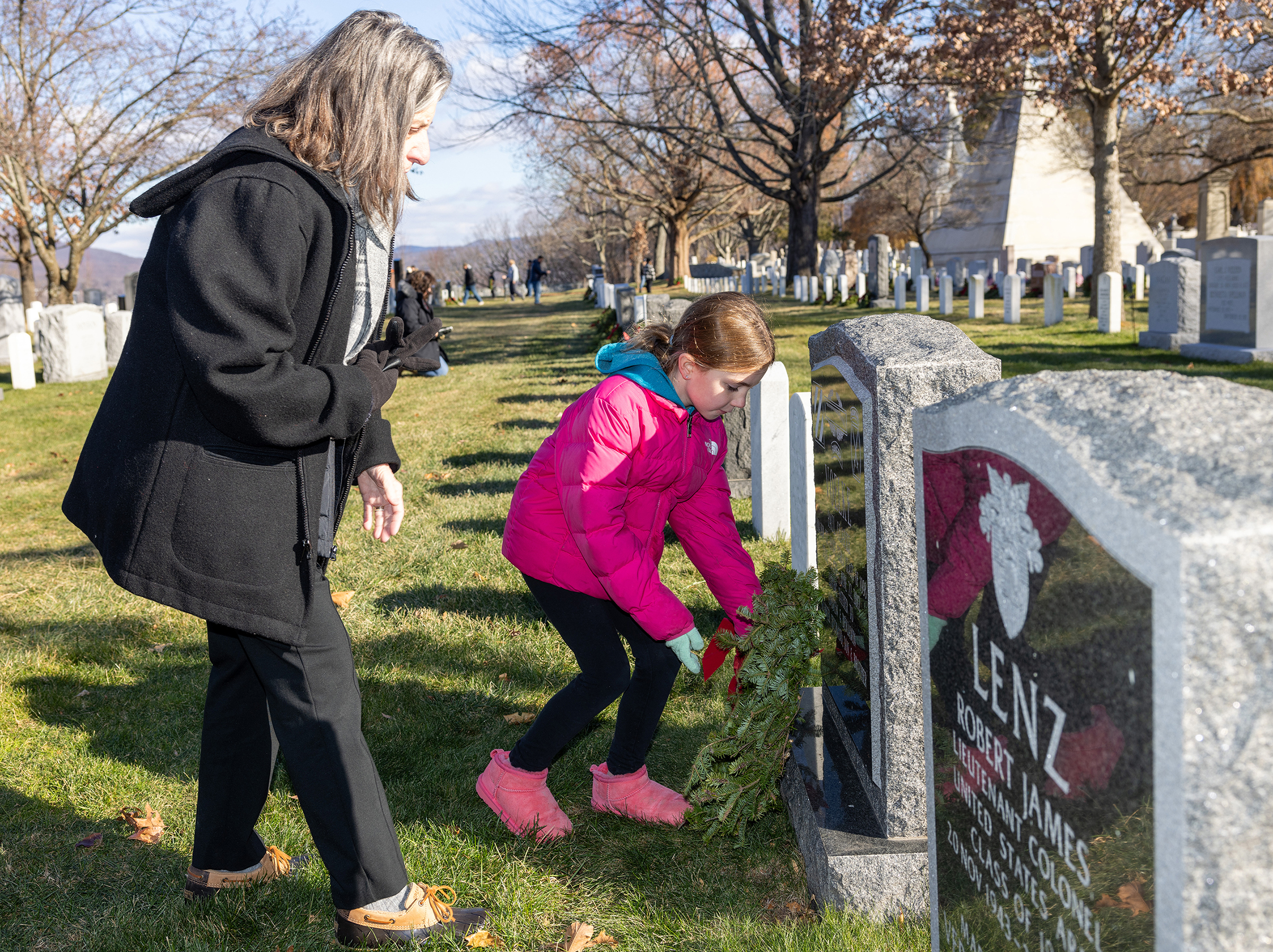 Several hundred volunteers took part in placing 7,350 wreaths throughout the West Point Cemetery during the 15th annual Wreaths Across America on Dec. 7.  (Photo by Eric S. Bartelt/USMA PAO)