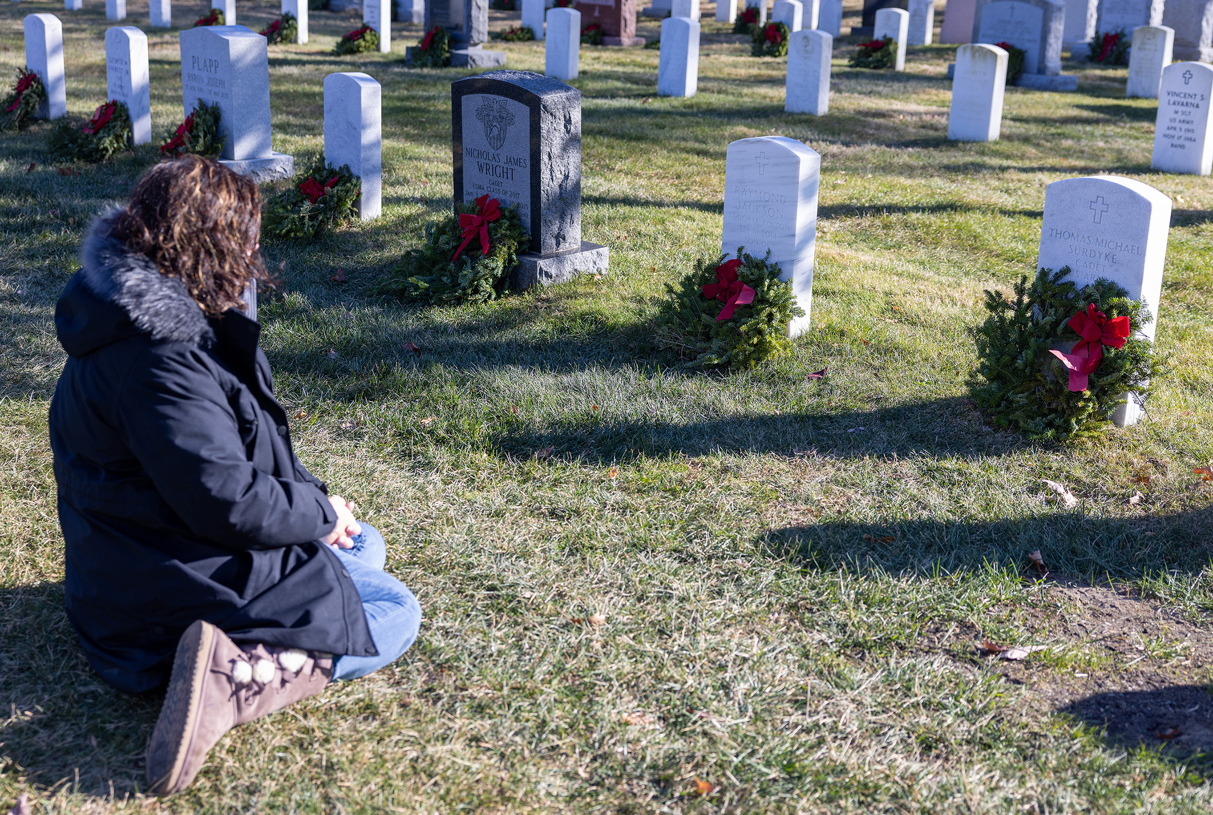 Several hundred volunteers took part in placing 7,350 wreaths throughout the West Point Cemetery during the 15th annual Wreaths Across America on Dec. 7.  (Photo by Eric S. Bartelt/USMA PAO)