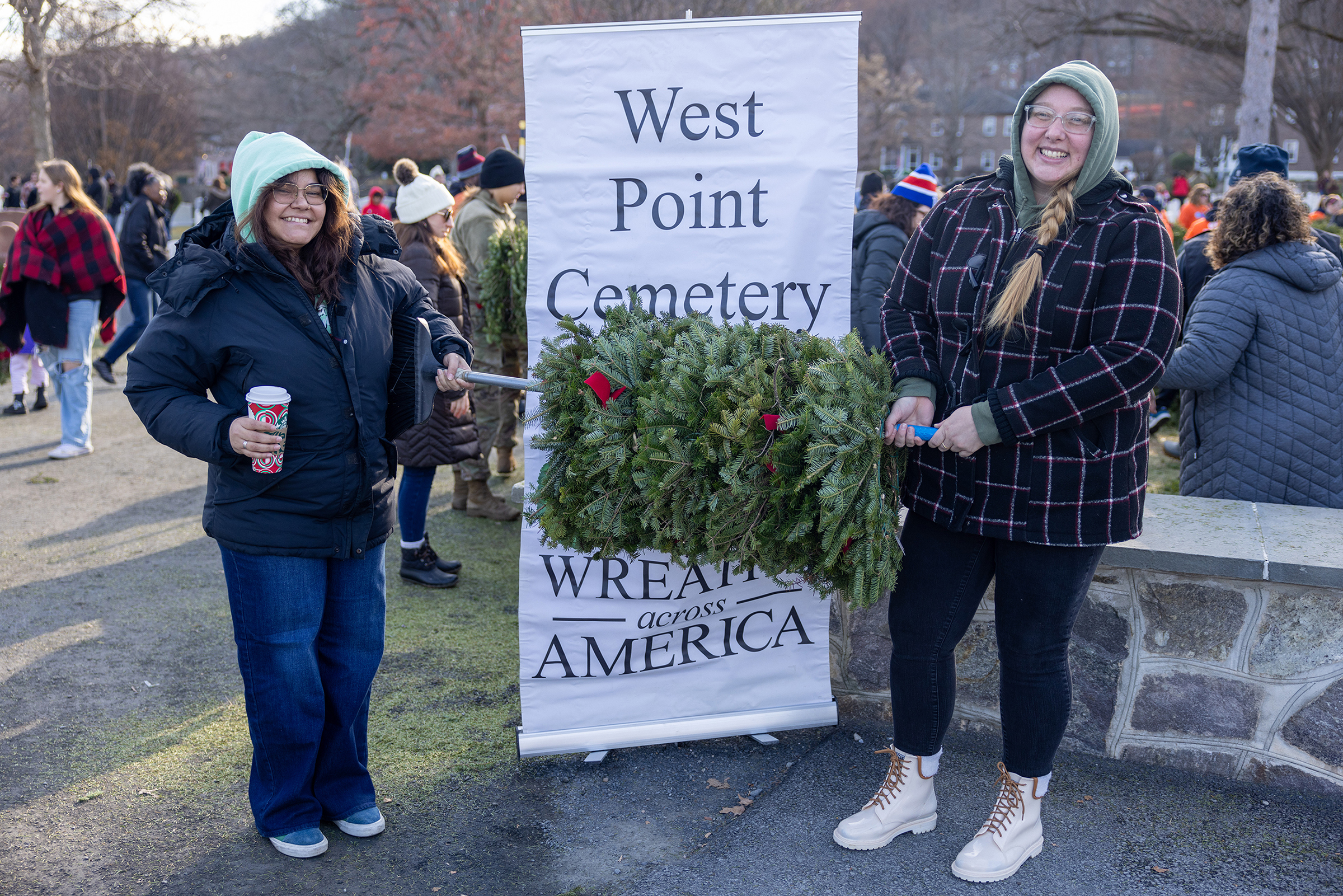 Several hundred volunteers took part in placing 7,350 wreaths throughout the West Point Cemetery during the 15th annual Wreaths Across America on Dec. 7.  (Photo by Eric S. Bartelt/USMA PAO)
