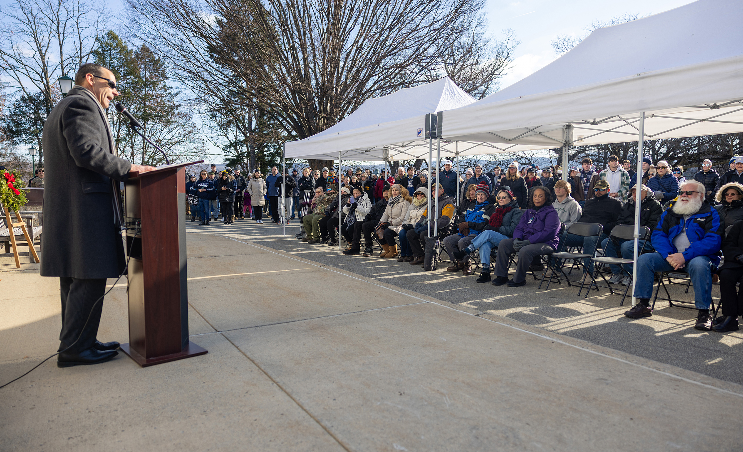 Several hundred volunteers took part in placing 7,350 wreaths throughout the West Point Cemetery during the 15th annual Wreaths Across America on Dec. 7.  (Photo by Eric S. Bartelt/USMA PAO)