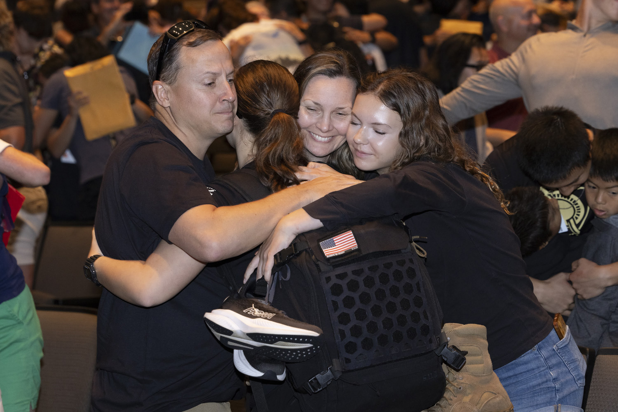 Parents of the U.S. Military Academy Class of 2028 take in the West Point environment as their children begin their 47-month journey at the academy on Reception Day on July 1.  (Photo by Kyle Osterhoudt/USMA PAO)