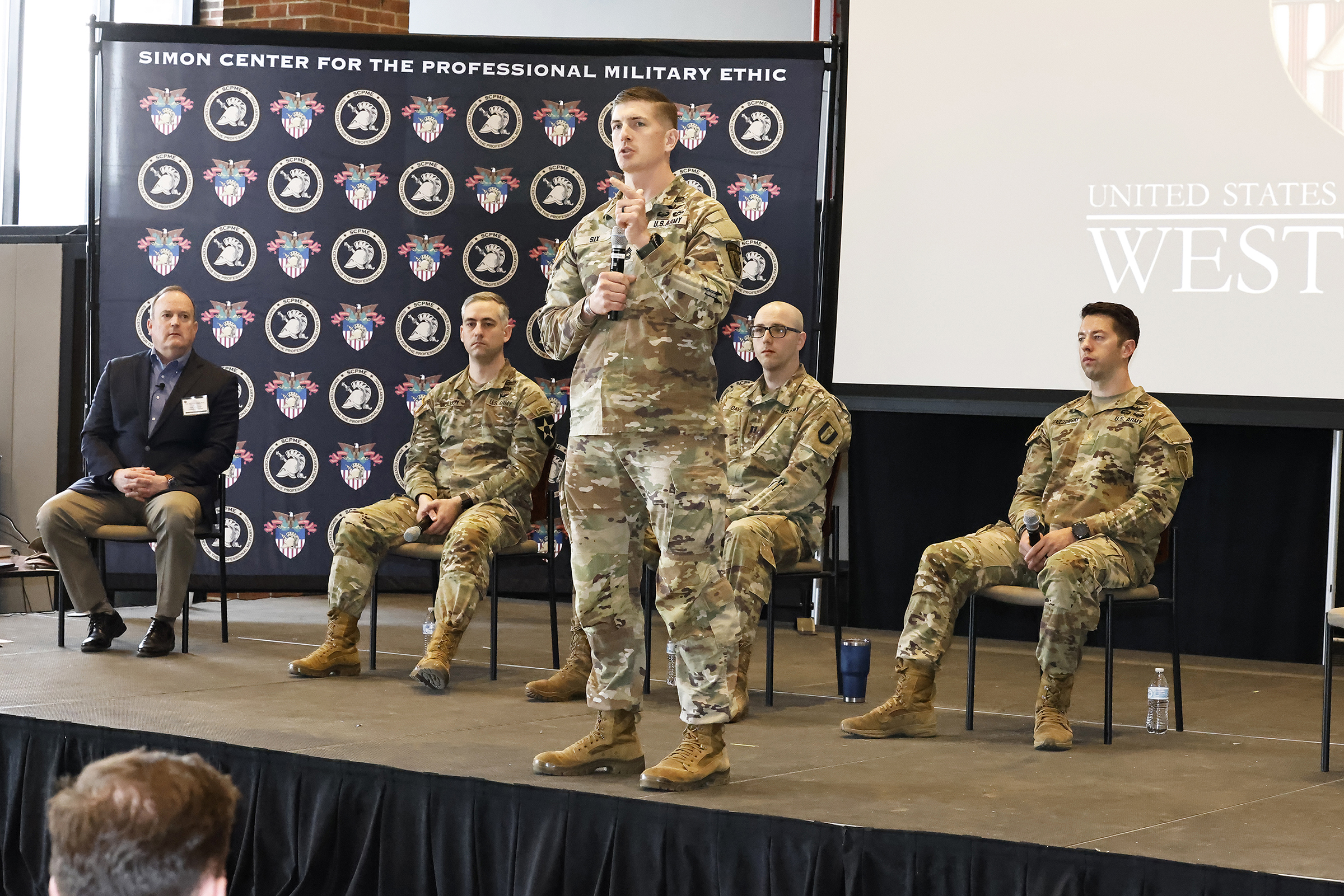 The first-class cadets, with staff and faculty, participated in the Mission Command Conference (MCC) from March 19-20 at Eisenhower Hall, where they were presented real-world challenges by the officers and noncommissioned officers who had boots on the ground in dire situations to help reinforce the importance of character and leading through mission command.  This year’s conference theme was “Establishing Trust: A Legacy at Home and Abroad,” and it allowed cadets to listen and discuss with the panel members