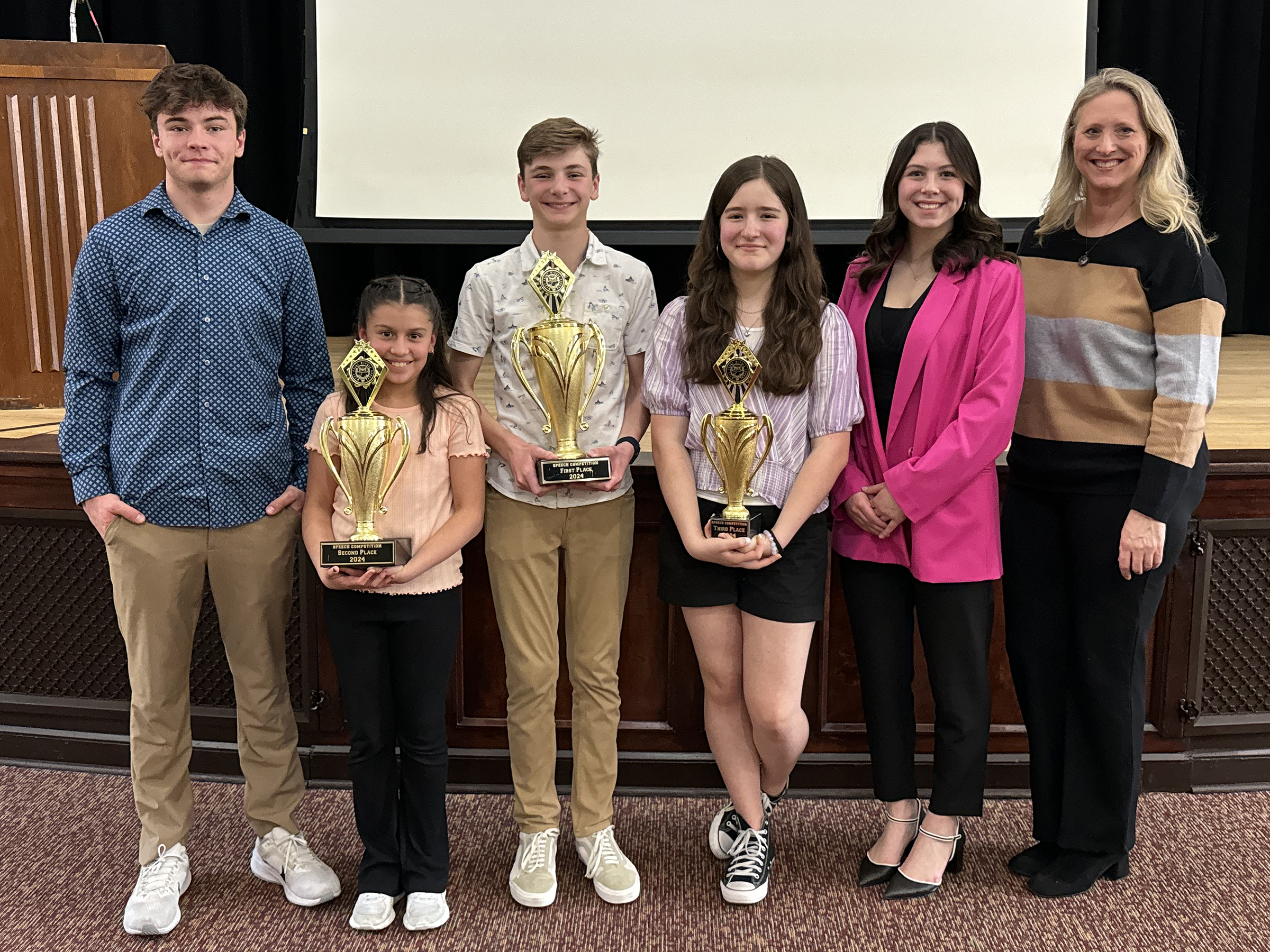 The West Point Middle School (WPMS) hosted an awards ceremony for the 9th annual WPMS Speech Contest on March 14. This year's topic was, “Our Generation: What Makes Us Special,” and the top three awardees and finalists were honored during the ceremony.  This year, first place was awarded to Ben Read, second place was awarded to Ana Diaz-Benitez, and Lillyne Weber took third place. The speech contest finalists were Dante Garcia, Nora Pfaff and Eve Waite.  (Photo provided by Chad Haley)