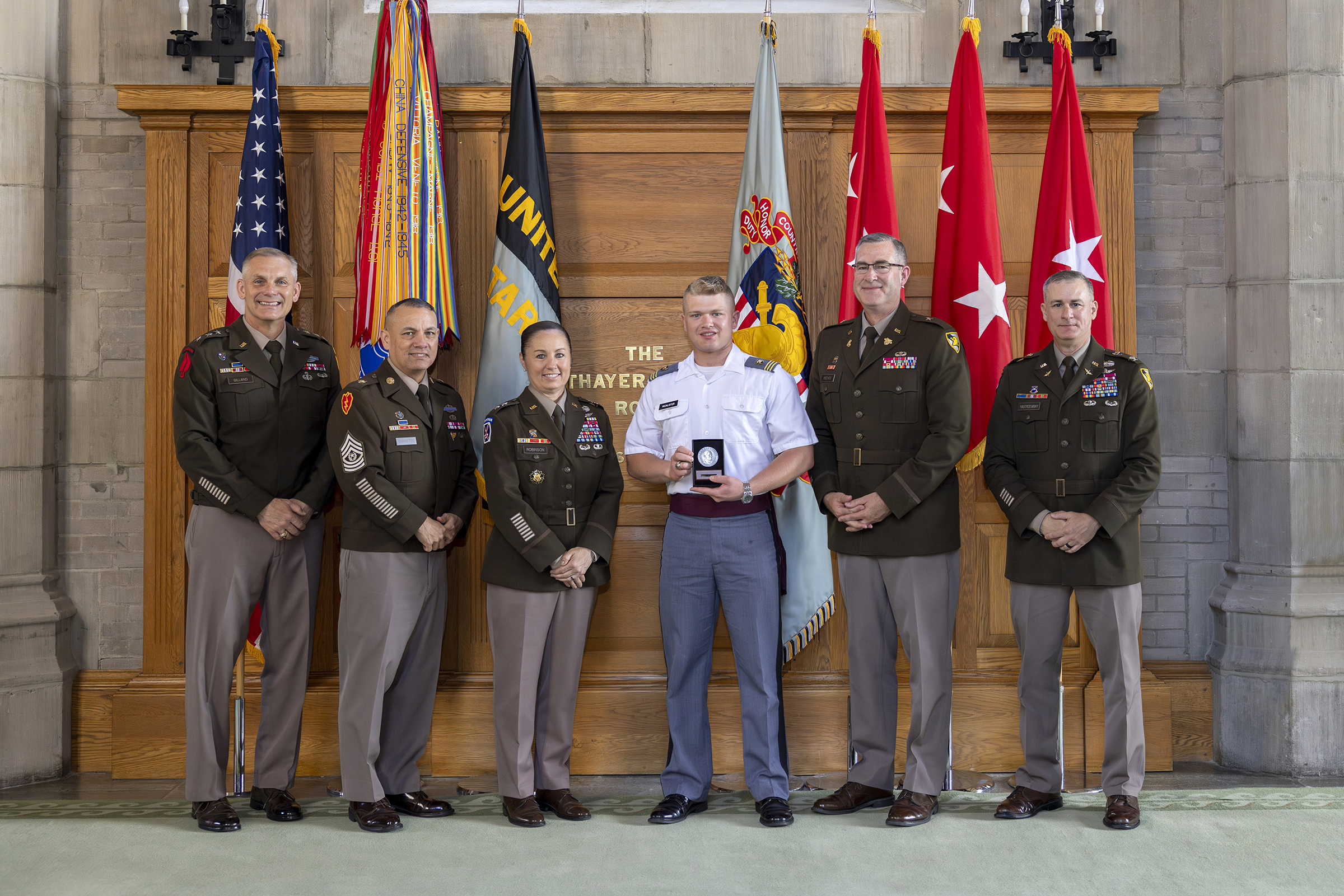 The Simon Center for the Professional Military Ethic hosted the John J. Pershing Reflective Essay Award ceremony on May 22 at the Thayer Award Room. Established in 2006, the award is meant to encourage cadets to reflect on their experiences at West Point and gain a better understanding for how the institution has helped them prepare for the profession of arms and to strengthen their resolve to serve the nation honorably as a commissioned officer. This year, the top three cadets who earn medallions were Clas