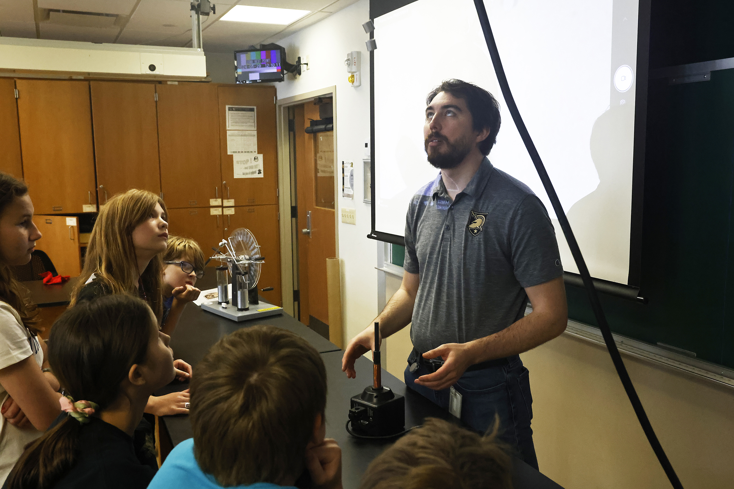 Approximately 50 fifth graders from the West Point Elementary School took a field trip to Bartlett Hall May 29 to experience a science adventure with professors and instructors from the Chemistry and Life Sciences (CLS) and Physics and Nuclear Engineering (PANE) Departments.  (Photo by Eric S. Bartelt/USMA PAO)