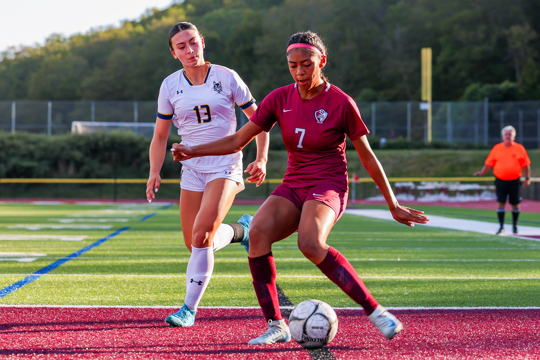 Jael-Marie Guy prepares to pass the ball during a match against Highland High School at James I. O’Neill High School, Highland Falls, N.Y. on Sep. 21, 2024. (U.S. Army photo by Sgt. 1st Class Alan Brutus)