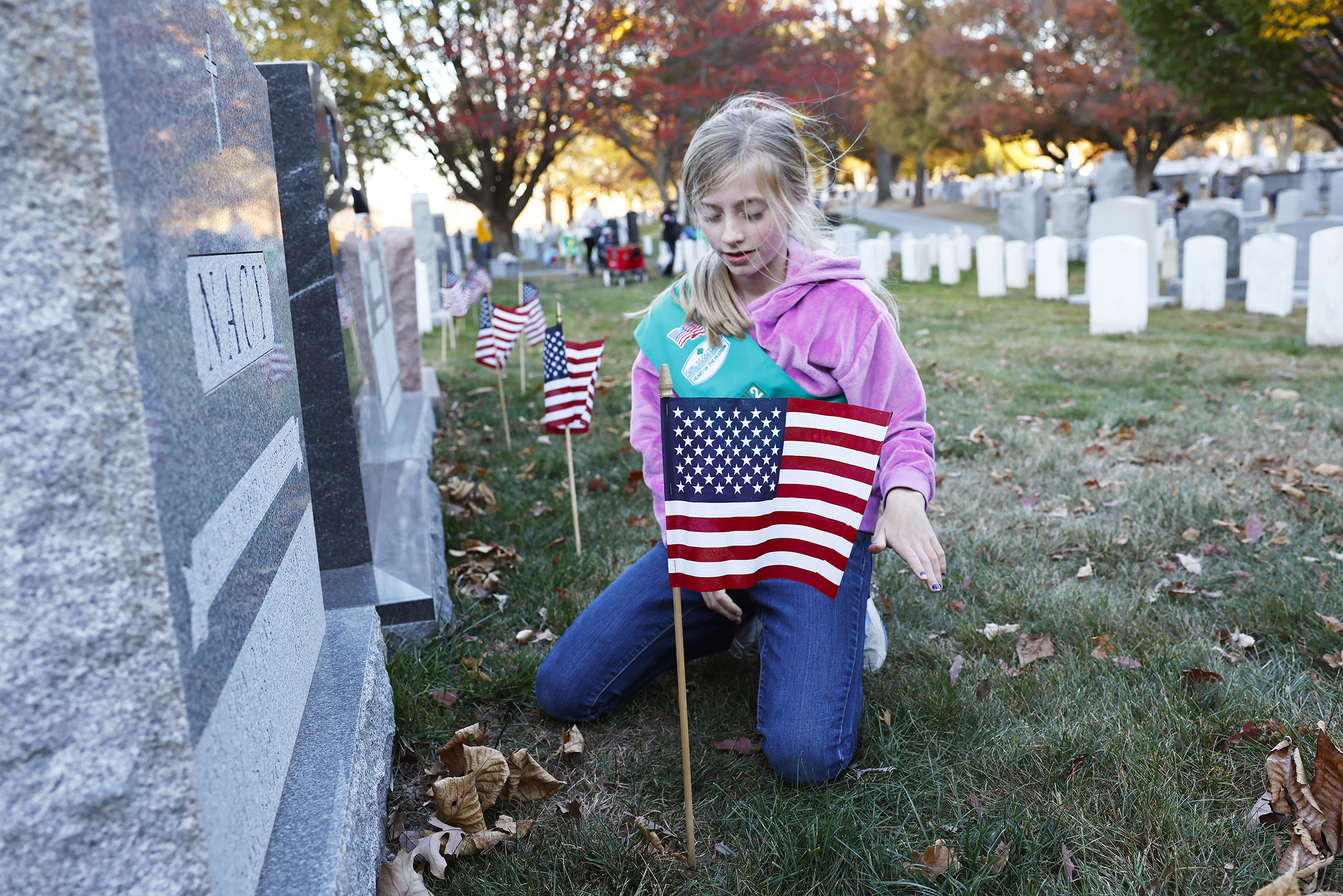 More than one hundred members of the West Point community came out in full force to honor veterans during an American Flag planting event on Nov. 7 at the West Point Cemetery.  (Photo by Eric S. Bartelt/USMA PAO-VI)
