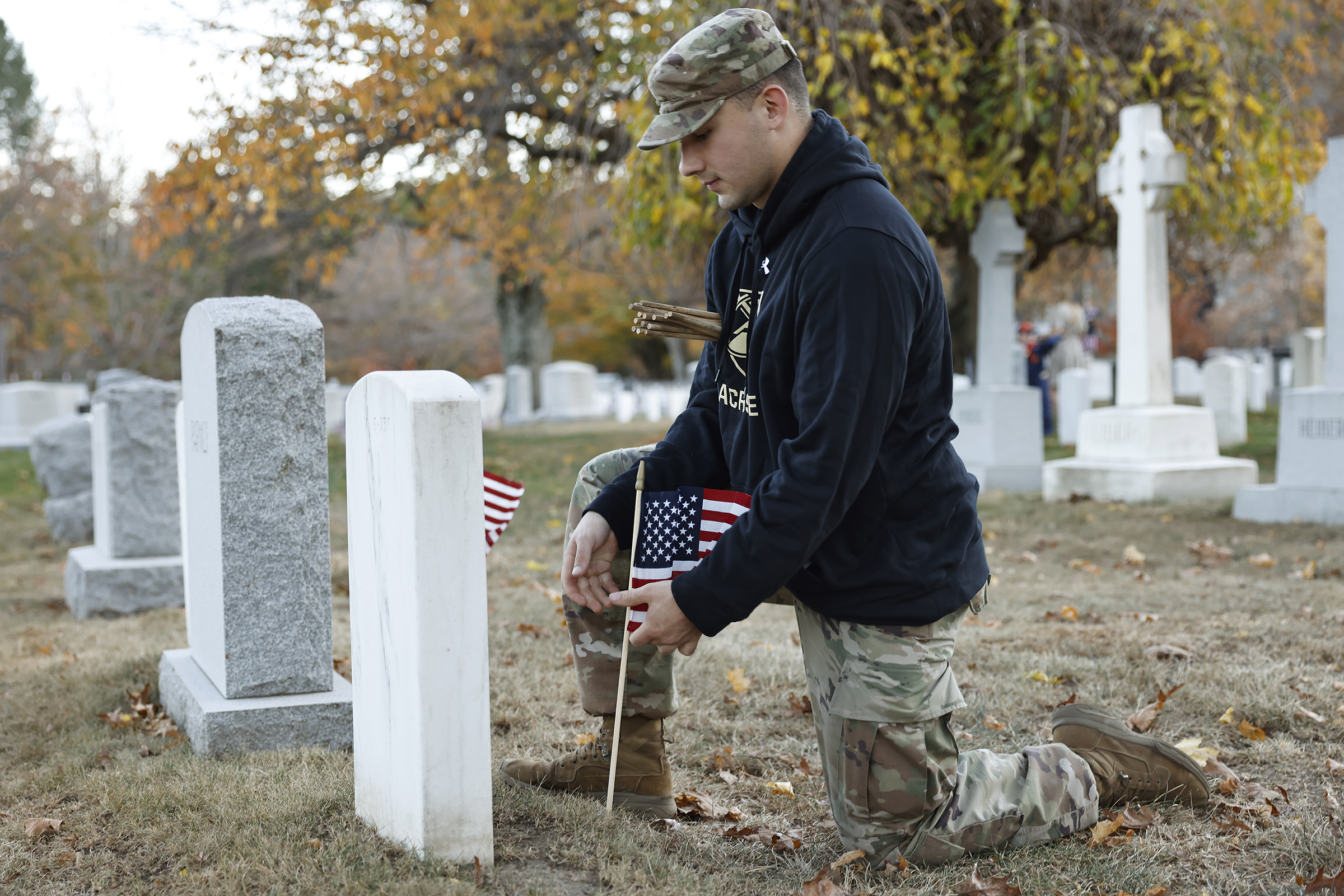 More than one hundred members of the West Point community came out in full force to honor veterans during an American Flag planting event on Nov. 7 at the West Point Cemetery.  (Photo by Eric S. Bartelt/USMA PAO-VI)