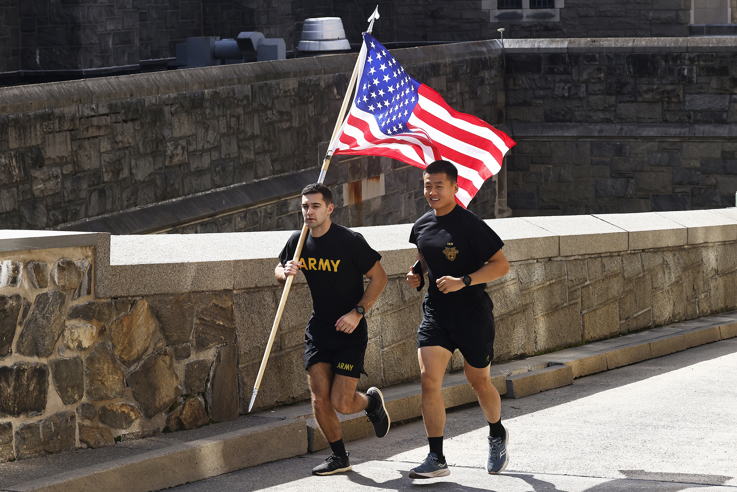 Members of 2nd Battalion, 4th Regiment of the U.S. Military Academy Corps of Cadets commemorated the victims of the 9/11 terrorist attacks in 2001 by running the American Flag throughout Central Area to the West Point Cemetery and back throughout the day on Sept. 11 at West Point.  (Photo by Eric S. Bartelt/USMA PAO)