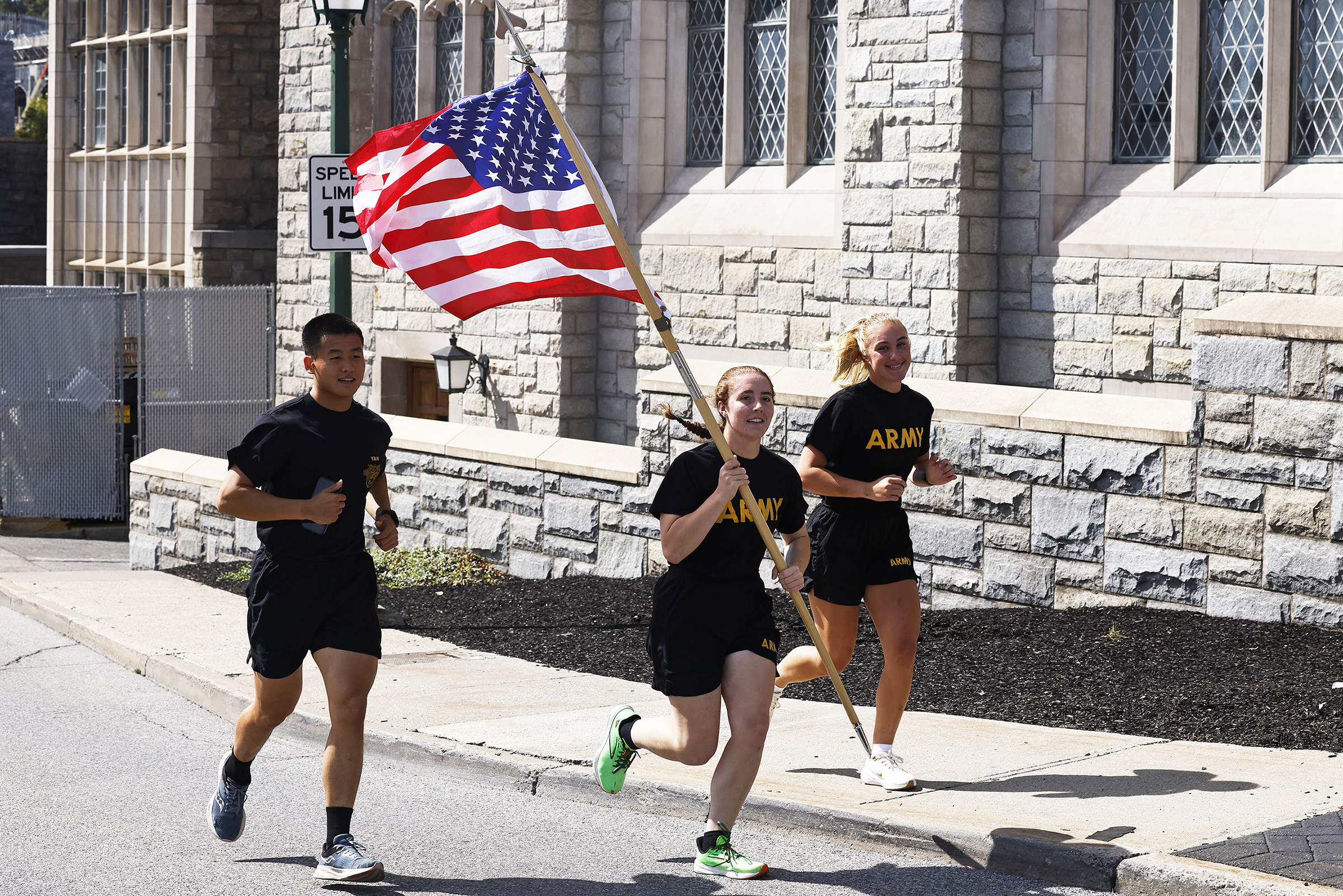 Members of 2nd Battalion, 4th Regiment of the U.S. Military Academy Corps of Cadets commemorated the victims of the 9/11 terrorist attacks in 2001 by running the American Flag throughout Central Area to the West Point Cemetery and back throughout the day on Sept. 11 at West Point.  (Photo by Eric S. Bartelt/USMA PAO)