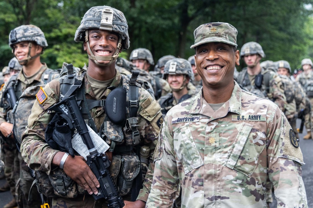 A cadet and mentor pose at March Back.