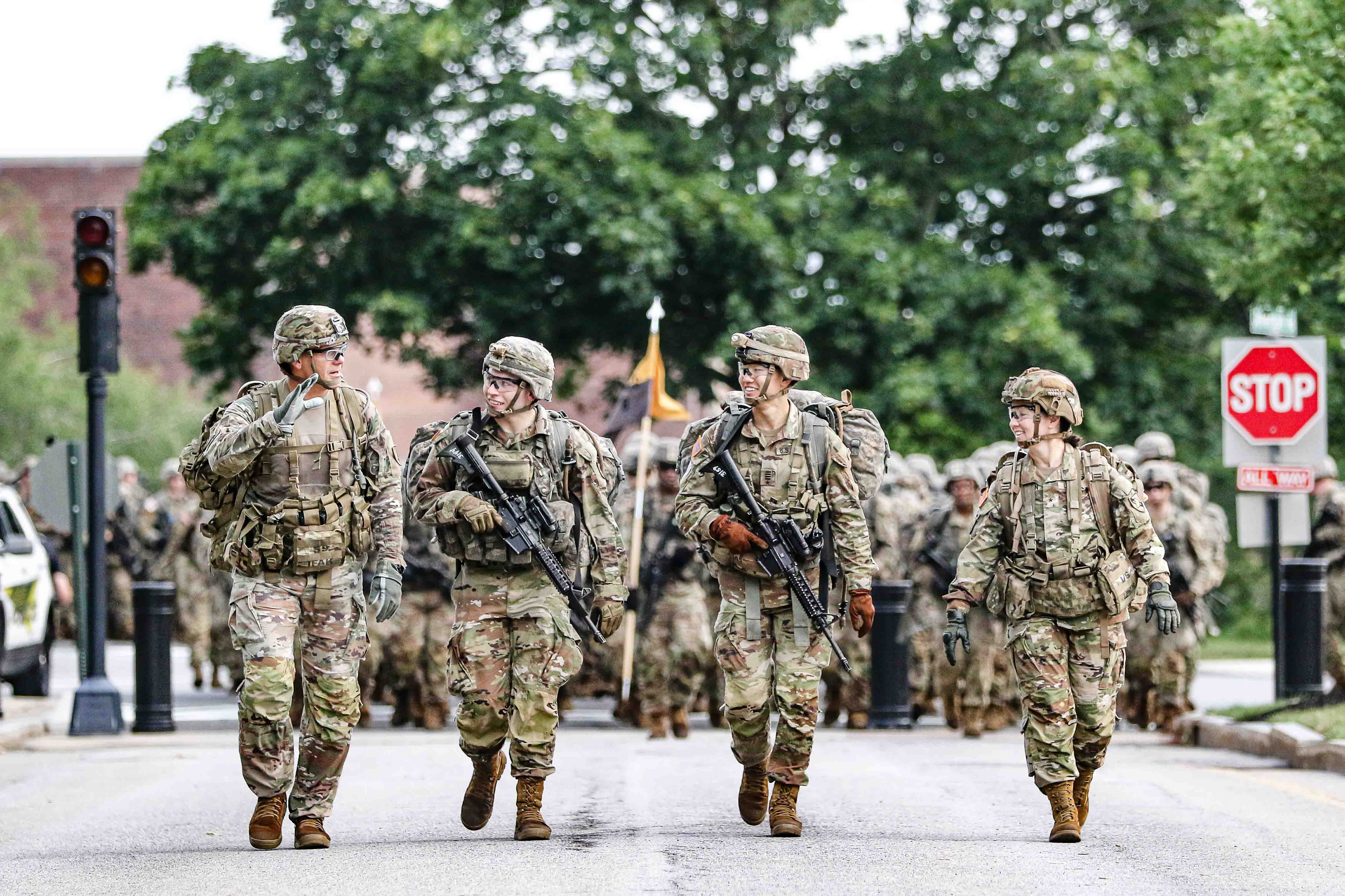 From left to right, Superintendent Lt. Gen. Steve Gilland, Class of 2024 Cadet Jacques Schold, the Regimental Commander for Cadet Field Training, Class of 2024 Cadet Calvin Lu, the Regimental Command Sgt. Maj., and the Commandant of the Corps of Cadet Brig. Gen. Lori Robinson arrive at Central Area with the Class of 2026 Cadets completing an 8-mile ruck march marking the completion of Cadet Field Training on June 28 at the U.S. Military Academy.