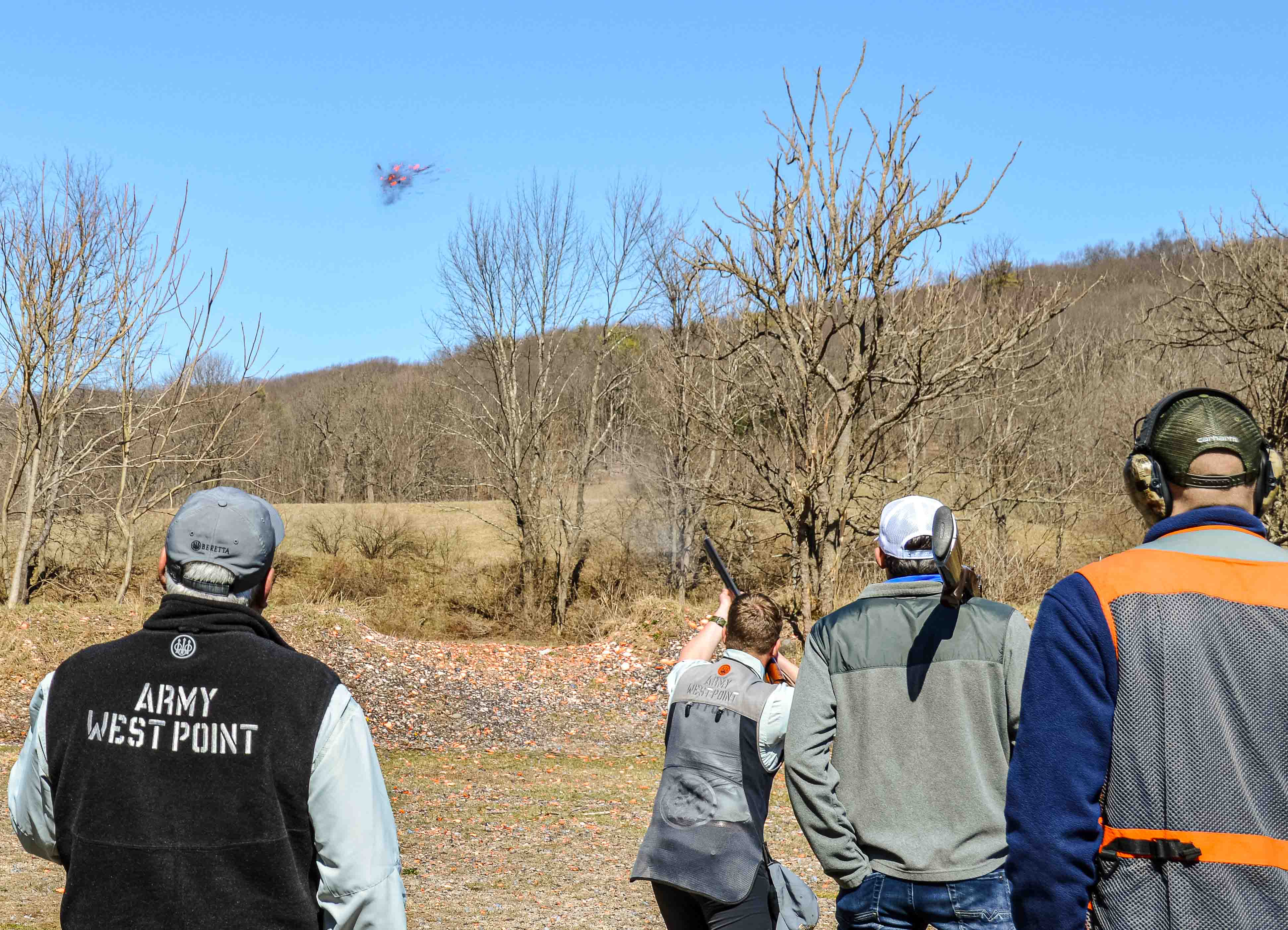 Hunter Smyth ’24 breaks the skeet target from the high house at station 8.