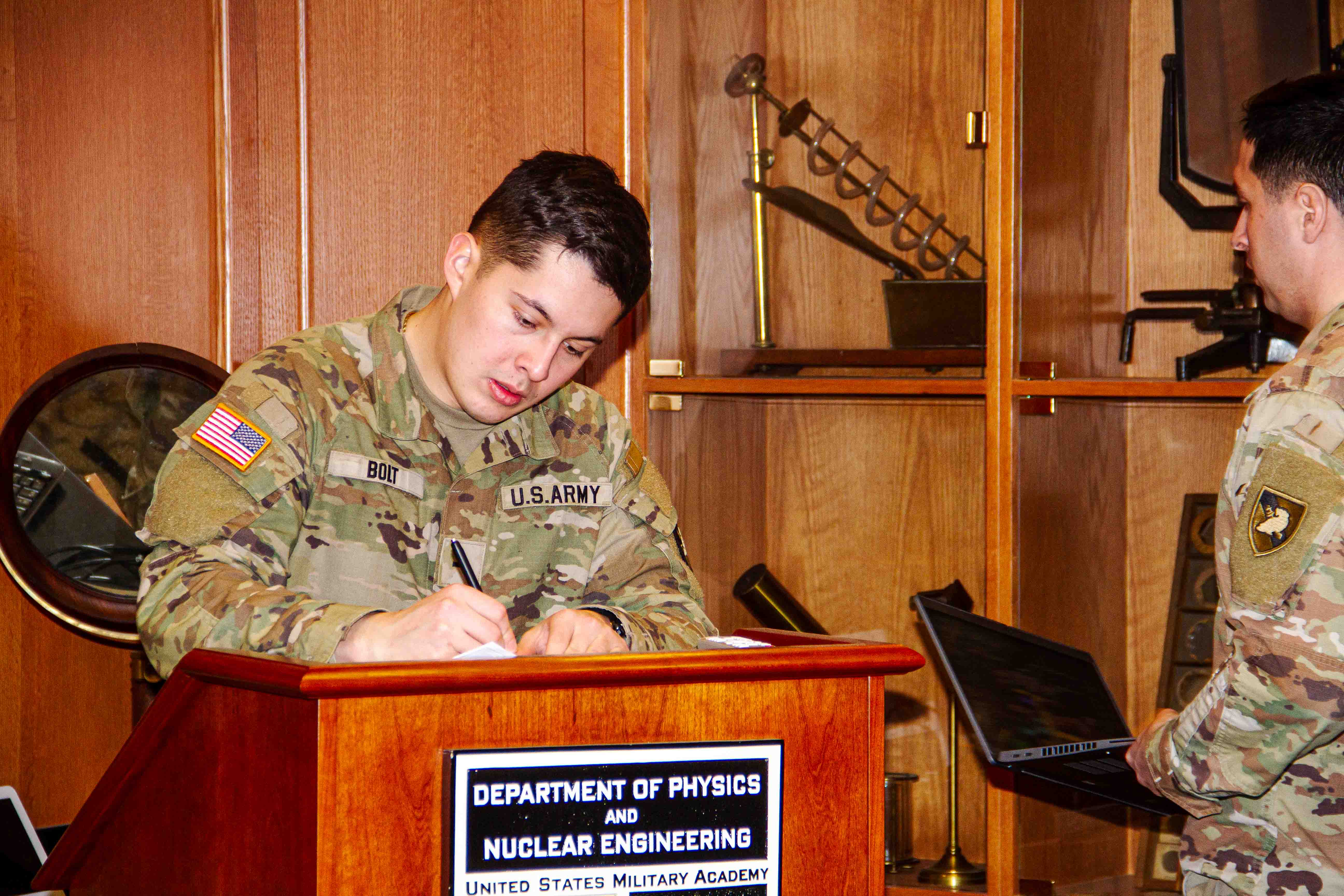 Class of 2025 Cadet Larry Bolt Preparing for his presentation at Bartlett Hall.