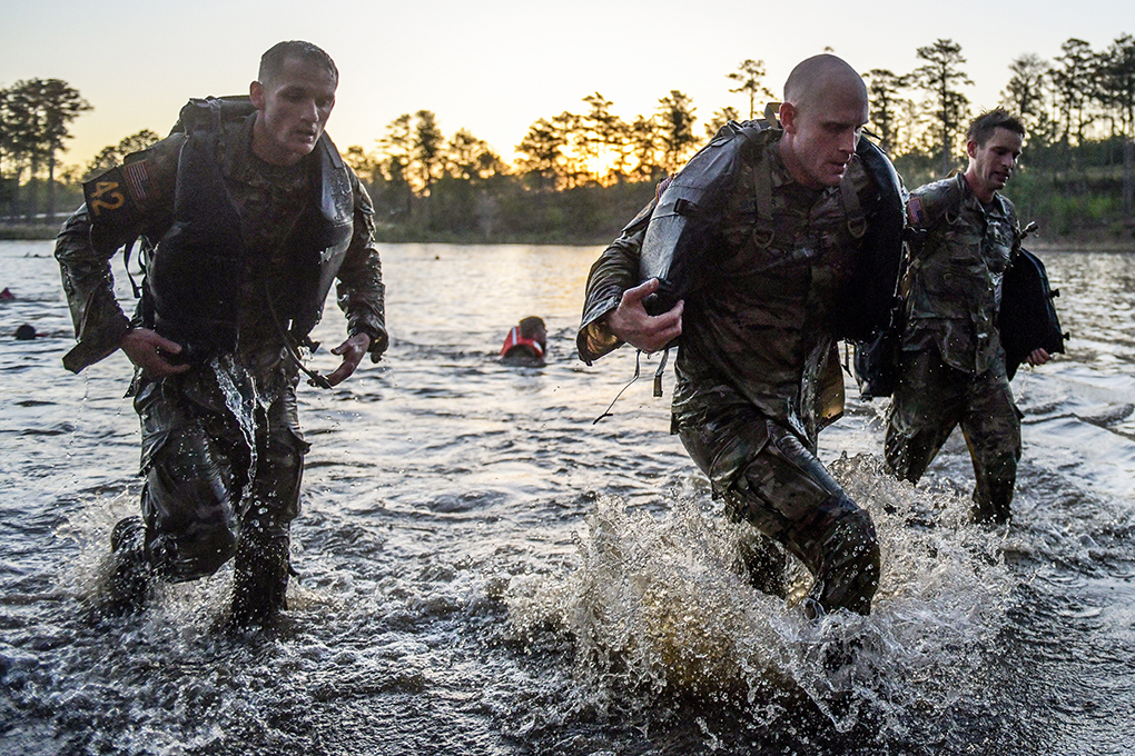 Poncho raft swimming was one of a myriad of skills that Majs. Matthew Snyder (right) and John Baer performed within 60 hours at the 38th annual Lt. Gen. David E. Grange Jr. Best Ranger Competition. 