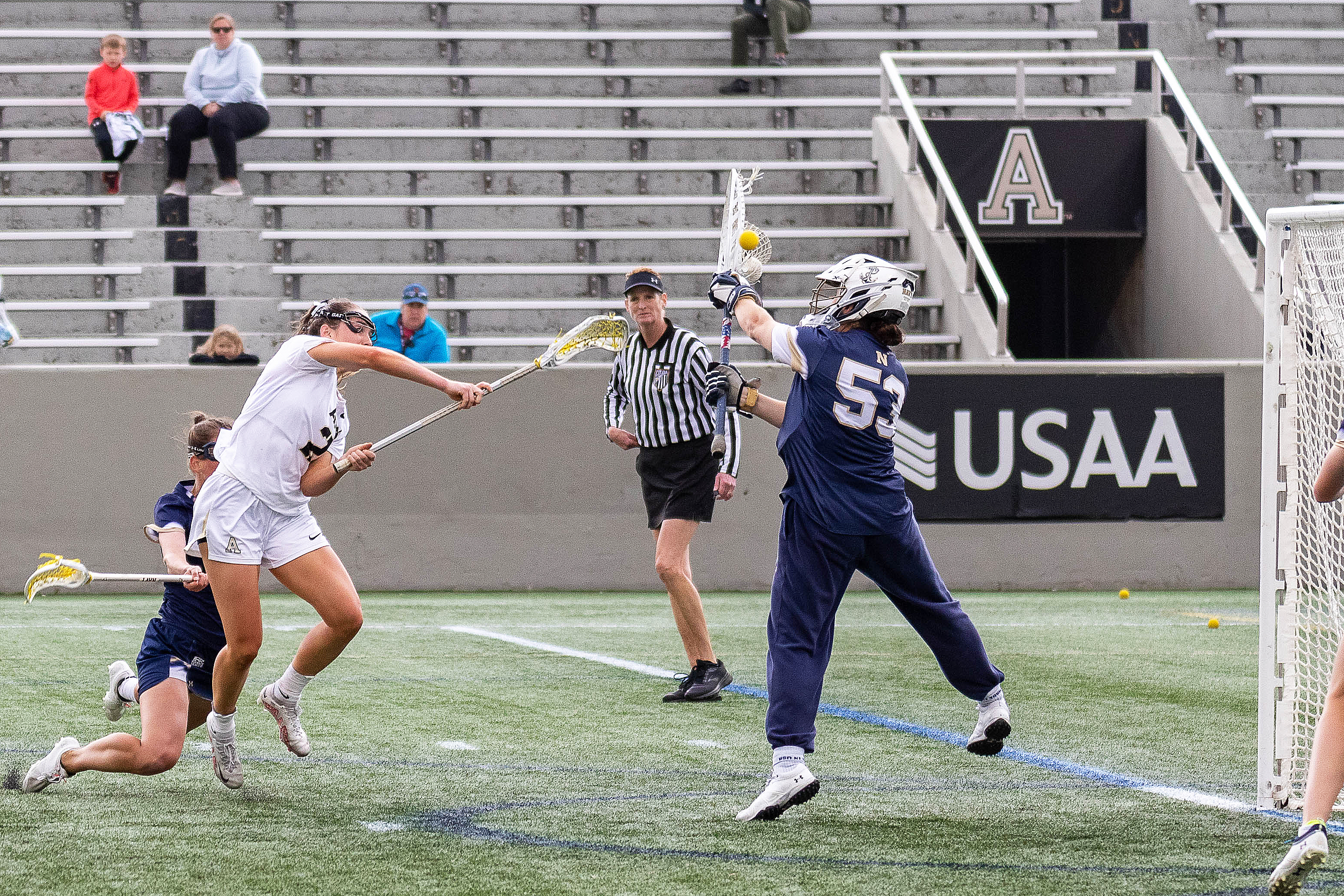 No. 16 Army West Point women's lacrosse (13-2, 7-1 Patriot League) defeated archrival No. 23 Navy (12-4, 6-2 Patriot League) by a score of 15-11 from Michie Stadium on April 22.  Plebe Allison Reilly delivered an all-time performance for the Black Knights, setting new single-game program records with nine goals scored and 12 points total with her three assists. One of four freshman in the starting lineup, Lindsey Serafine made nine saves in the cage while making her second career start.   (Photo by Class of