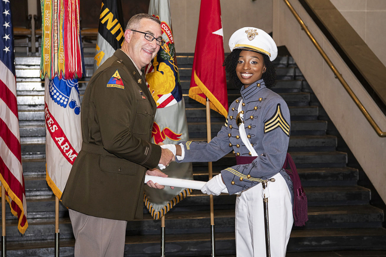 Friends and family gathered at Eisenhower Hall to celebrate the triumph of five Class of 2022 cadets as they battled their way through arduous circumstances to receive their diplomas and commission as second lieutenants during their Class of 2022 Graduation and Commissioning Ceremony Aug. 4 at the U.S. Military Academy. The diplomas were handed out by the Dean of the Academic Board Brig. Gen. Shane Reeves.  	            Photo by Kyle Osterhoudt/USMA PAO