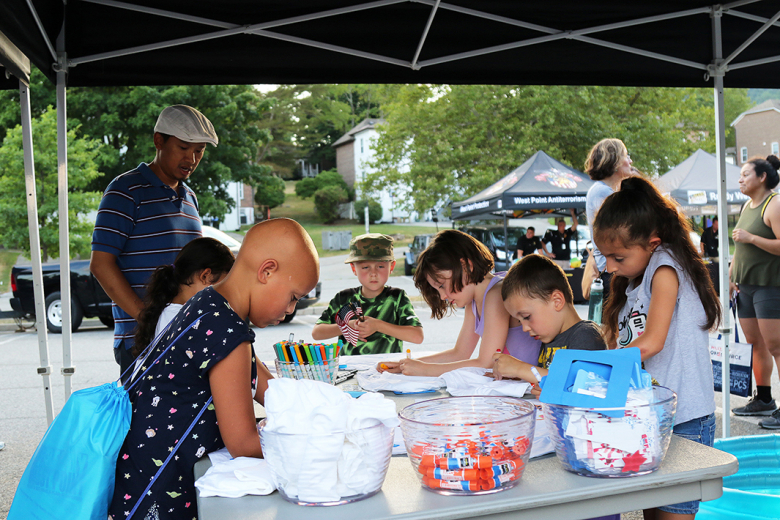 The U.S. Army Garrison West Point, West Point Directorate of Emergency Services in concert with West Point Family Homes hosted National Night Out, a nationwide event that focuses on strengthening the relationship between communities and their local police departments, Aug. 2 at the K Lot parking lot near the MWR Fitness Center. Since its inception in 1984, National Night Out is an annual community-building campaign that promotes community partnerships and neighborhood camaraderie to make neighborhoods safer