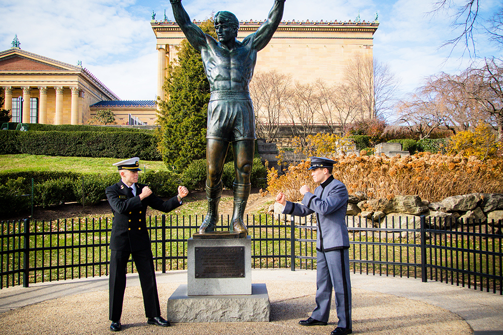 Class of 2023 Midshipman Jacob Lowe and Class of 2023 Cadet Josh Lowe pose for a photo in front of the Rocky Balboa statue in Philadelphia.    (Photo courtesy of Dave Lowe)
