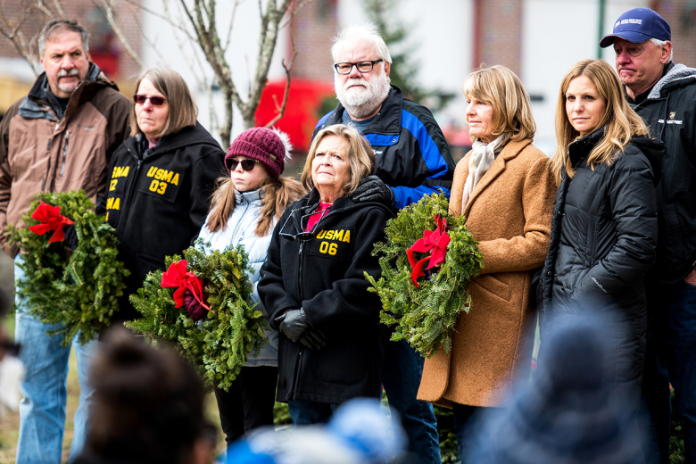 (Above) Gold Star family members honor their deceased service members and lay wreathes at their gravesites on Saturday at the West Point Cemetery. 