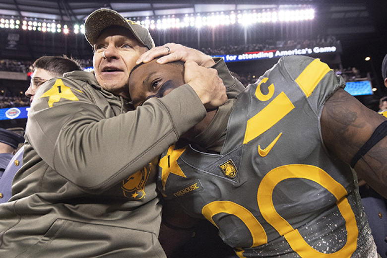 Army West Point football played the Navy Midshipmen in the 123rd annual Army-Navy Game Dec. 10 at Lincoln Financial Field in Philadelphia. For the first time in history, the Army-Navy Game was decided in overtime with the Black Knights kicking a 39-yard field goal for the 20-17 double-overtime victory. (Above, left and below) Cadets, Army players and head coach Jeff Monken celebrate with each other after the victory.    		Photo by John Pellino/USMA PAO