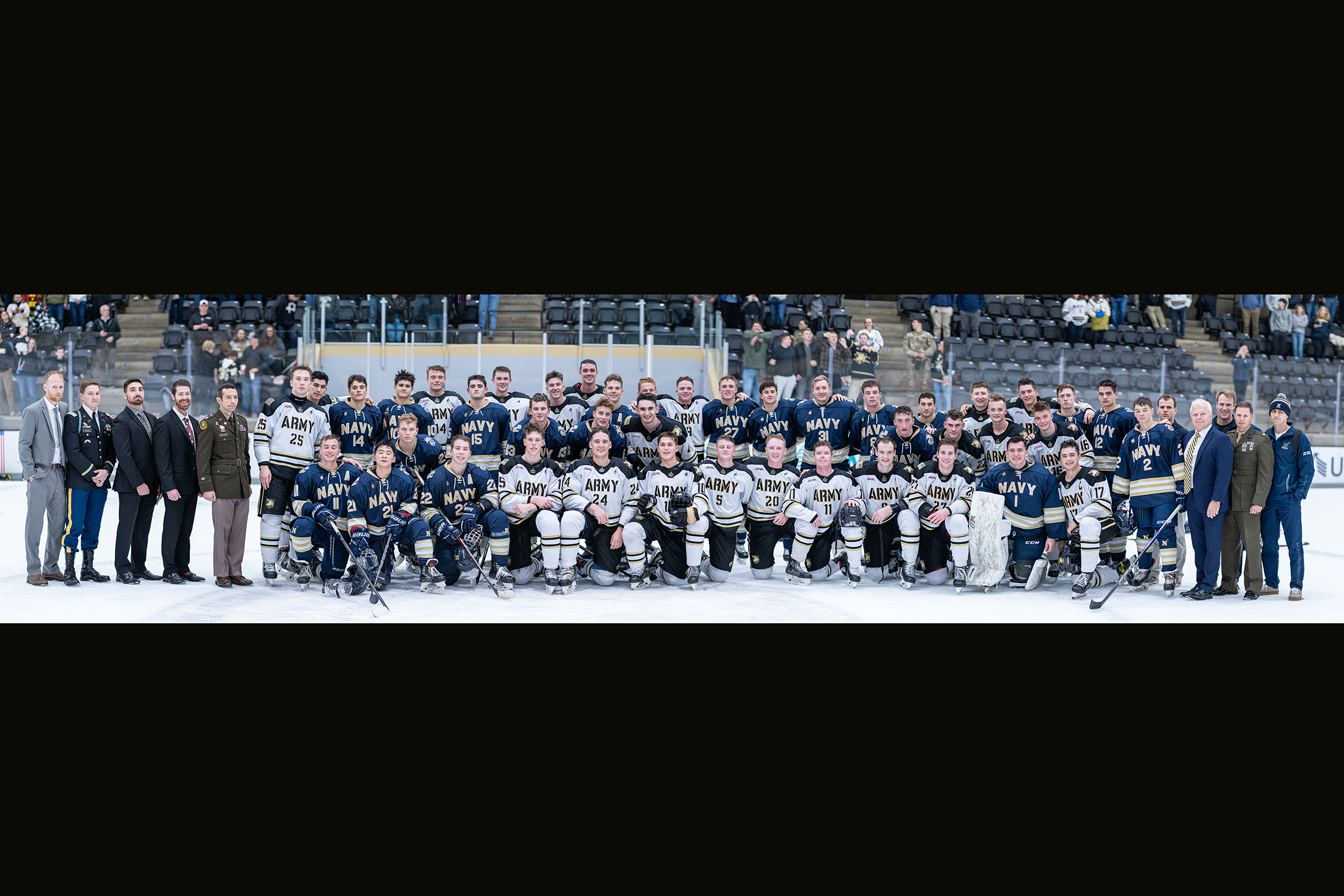 In a lively setting for the first-ever Army-Navy hockey game at Tate Rink on Dec. 2, the Black Knights rolled over the Midshipmen, 6-2, to extend their winning streak to 10 games on the season.    (Photo provided by Army West Point Club Hockey)