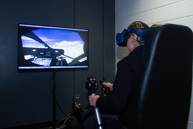 West Point became the first Department of Defense entity to onboard a first-of-its-kind, immersive Analytics Engine onto the U.S. Military Academy’s three Aviation Training Next (ATN) Systems. Lt. Col. James Schreiner, the director of the Engineering Management (EM) Program for the Department of Systems Engineering at West Point, demonstrates the latest technological advancements with the help of a cadet.     (Photo by Jorge Garcia/PV)