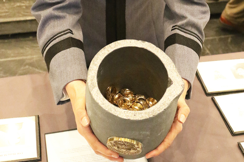 Family, friends, U.S. Military Academy leadership and Class of 2024 Cadets gathered in Crest Hall Friday for the 23rd annual West Point Association of Graduatesʼ Ring Melt, sponsored by the USMA Class of 1966. Sixty-seven rings were donated and melted into a gold ingot that will be included into the Class of 2024 rings and future class rings. This yearʼs donated rings represented the classes of 1924 to 2006 with 11 rings from the 50-year affiliate class, USMA Class of 1974. (Right) Class of 2024 Cadet and 