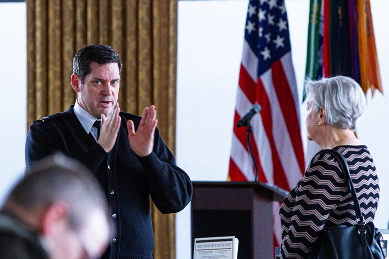 Col. Jordon Swain speaks with a member of the audience during the West Point Press Launch Monday at the U.S. Military Academy.      Photo by Jorge Garcia/PV