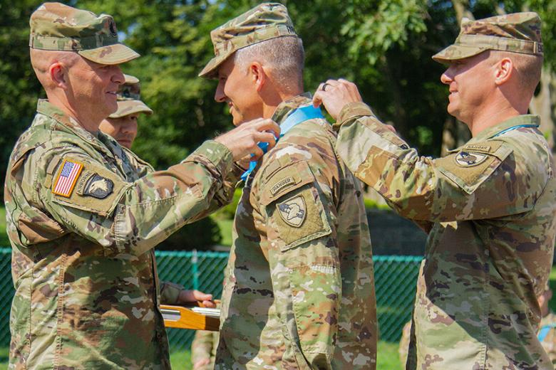 “Command Sgt. Maj. John Farlow (G-3 operations sergeant major, above center), Sgts. 1st Class Brandon George and Tony Giannone, and Staff Sgts. Ronnie Castro and Adam Cayton received powder blue ribbon medallions for displaying integrity beyond reproach and the utmost professionalism,” Engstrom said. “Their leadership qualities can be characterized by personal concern for the needs, training, development and welfare of Soldiers.” 