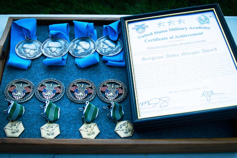 Engstrom said the inductees were challenged with a multi-level boarding process comprised of a mixture of hands-on events and oral boards. The West Point selection process is held semi-annually, culminating with the selection of top-tier noncommissioned officers to be inducted into the Sgt. Audie Murphy Club. When an NCO is inducted, he or she is presented with a medallion (above) suspended by a broad powder blue ribbon, representing the traditional color of the infantry, and a certificate.
