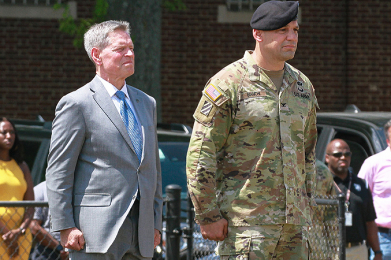 Friends, faculty and staff gathered at Buffalo Soldier Field to participate in the U.S. Army Garrison West Point Change of Command ceremony on Friday at the U.S. Military Academy. The outgoing commander, Col. Evageline G. Rosel (bottom left), relinquished command to incoming commander, Col. Anthony J. Bianchi (above left), whoʼs receiving the guidon establishing him as the new USAG West Point commander. Following the ceremony, the incoming and outgoing commanders hosted a joint reception at the West Point C