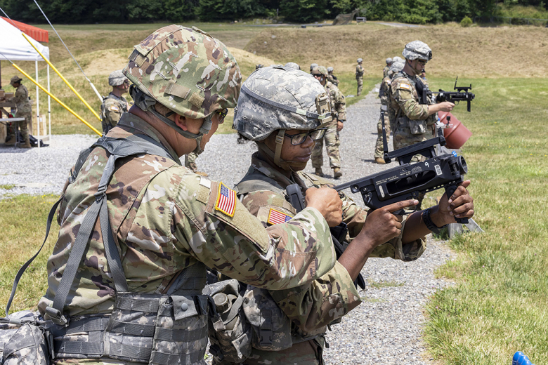 New cadets from the U.S. Military Academy Class of 2026 receive familiarization training with the M320 Grenade Launcher Module (GLM) during Cadet Basic Training July 21 at West Point. The M320 GLM is a versatile single-shot weapon. It can be employed as a standalone weapon or mounted onto another weapon, such as the M16 assault rifle and the M4 carbine. 	(Photo by Christopher Hennen/USMA PAO)