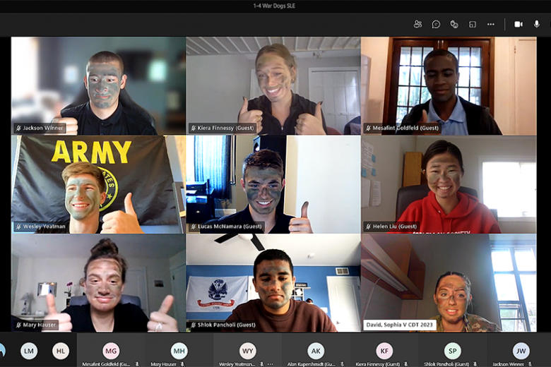 Class of 2023 Cadet Sophia David (lower right) teaches the use of camouflage to the eight high school students assigned to her 1st Platoon, 4th Squad during Summer Leader Experience.  