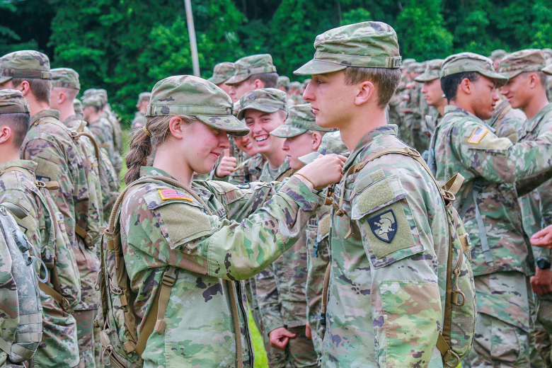 Class of 2025 cadets receive their rank during the Cadet Field Training graduation and awards ceremony June 12 at Landing Zone Owl at Camp Buckner.  
