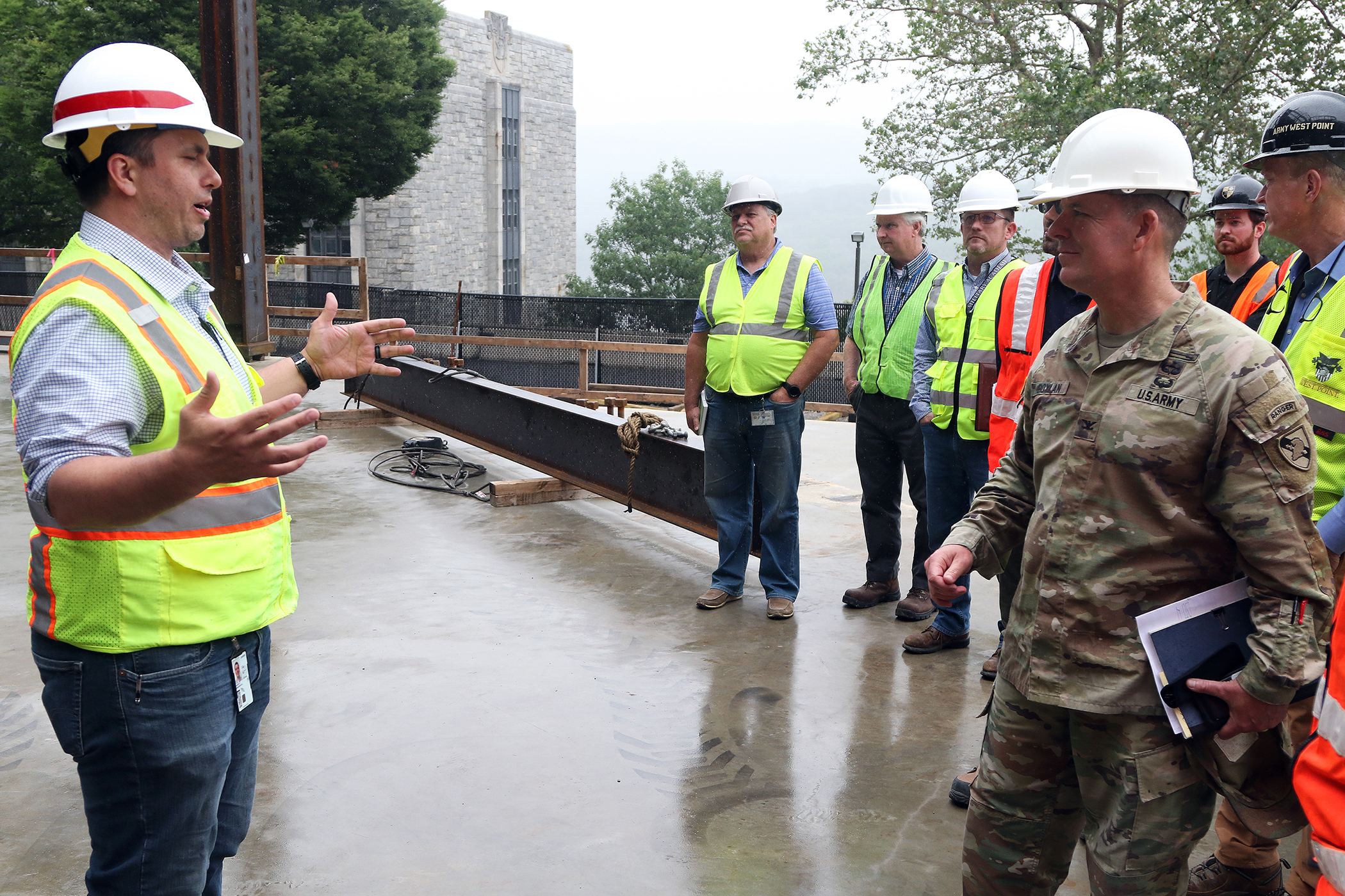 One of the final beams was placed on top of the future Cyber and Engineering Academic Center (CEAC) during a ceremony June 22 at the U.S. Military Academy. Traditionally, a beam topping ceremony is the celebration of the last beam placed on the building and marks a major milestone in the construction process of that building.  (Photo by Eric S. Bartelt/PV)