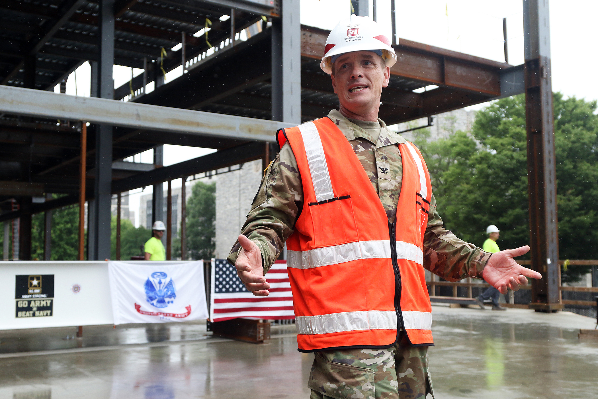 One of the final beams was placed on top of the future Cyber and Engineering Academic Center (CEAC) during a ceremony June 22 at the U.S. Military Academy. Traditionally, a beam topping ceremony is the celebration of the last beam placed on the building and marks a major milestone in the construction process of that building.  (Photo by Eric S. Bartelt/PV)