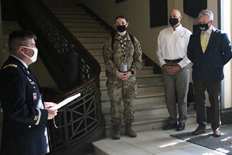 U.S. Military Academy 1988 graduate and Department of Systems Engineering instructor Maj. Brian Mahoney speaks to the group about Tillar during the ceremony.