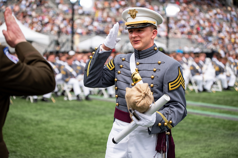 Toward the end of the graduation ceremony, the graduates burst into cheers at the announcement of the “Goat,” who is the lowest ranking cadet, and this year it was Class of 2021 Cadet Dominic DiStefano, and by tradition he received nearly $1,000 from his classmates. 