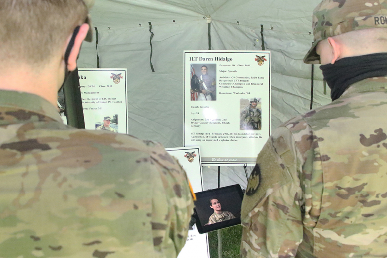 Class of 2023 cadets from Company C-3 watch a video of Maj. Lisa Beum, Army Cyber Institute public affairs officer, talking about 1st Lt. Daren Hidalgo during the 16th annual “Inspiration to Serve” Cemetery Tour April 29 at the West Point Cemetery. Aside from honoring fallen graduates, the tour allows yearlings to ponder their own upcoming decision as they strengthened their resolve to serve and commit to the Army during the Affirmation Ceremony in August.	