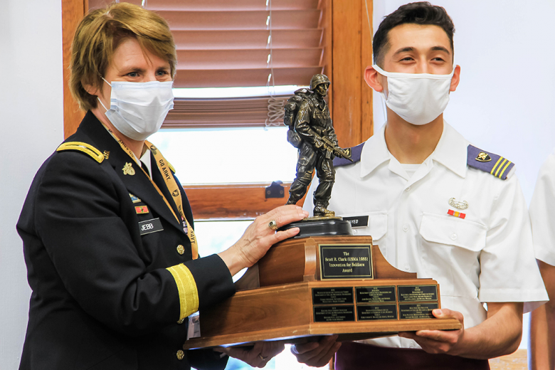 Team Warehouse Autonomous Robots (WAR) received the Scott R. Clark (USMA Class of 1985 graduate) Innovation for Soldiers Award on April 29 at Taylor Hall for its demonstration of innovative problem-solving methods that plans to improve the Army Warfighter. Brig. Gen. Cindy Jebb, the Dean of the Academic Board, presents the award to team member, Class of 2021 Cadet Andres Sayed.