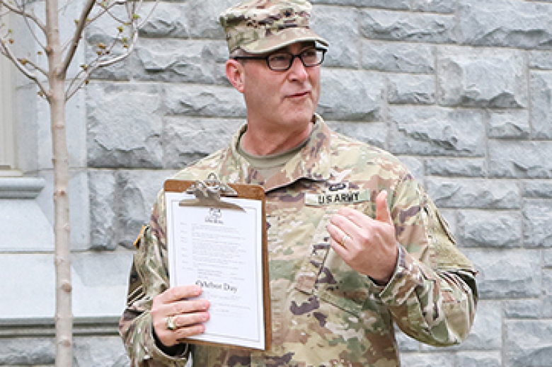 Dean of the Academic Board Brig. Gen. Shane Reeves, who also read the Arbor Day proclamation (bottom left), accompanied by cadets and Dirt Woman helped place dirt around the new tree.