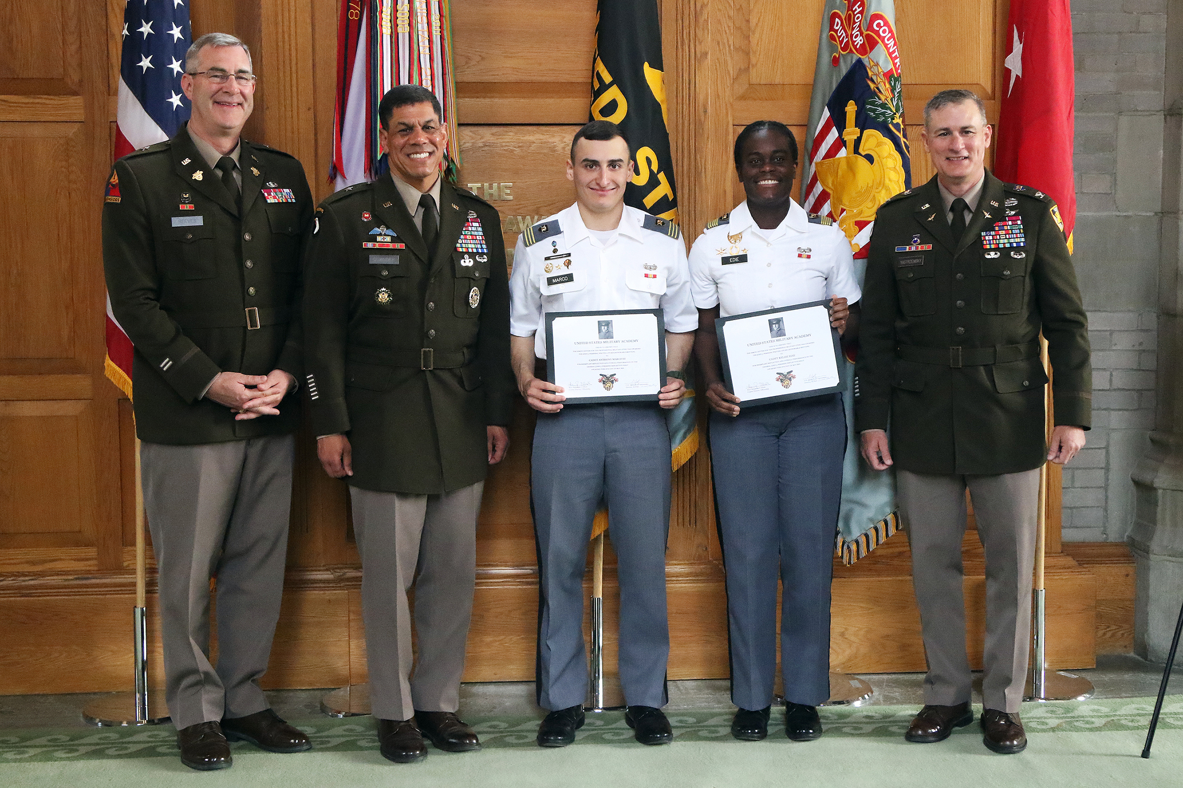 The Simon Center for the Professional Military Ethic (SCPME) hosted the 17th annual Gen. John J. Pershing Writing Award Ceremony May 24 at the Thayer Award Room. The award recognition ceremony acknowledged the top Firstie cadet awardees: Mercedez Fernandez (first place/gold medal), Jacob Lapin (second place/silver medal), Cora Haefner (third place/bronze medal) and honorable mention recipients Kelsie Edie and Anthony Marco III. Honorable mention awardee Shinkwang Moon was not present at the ceremony. 