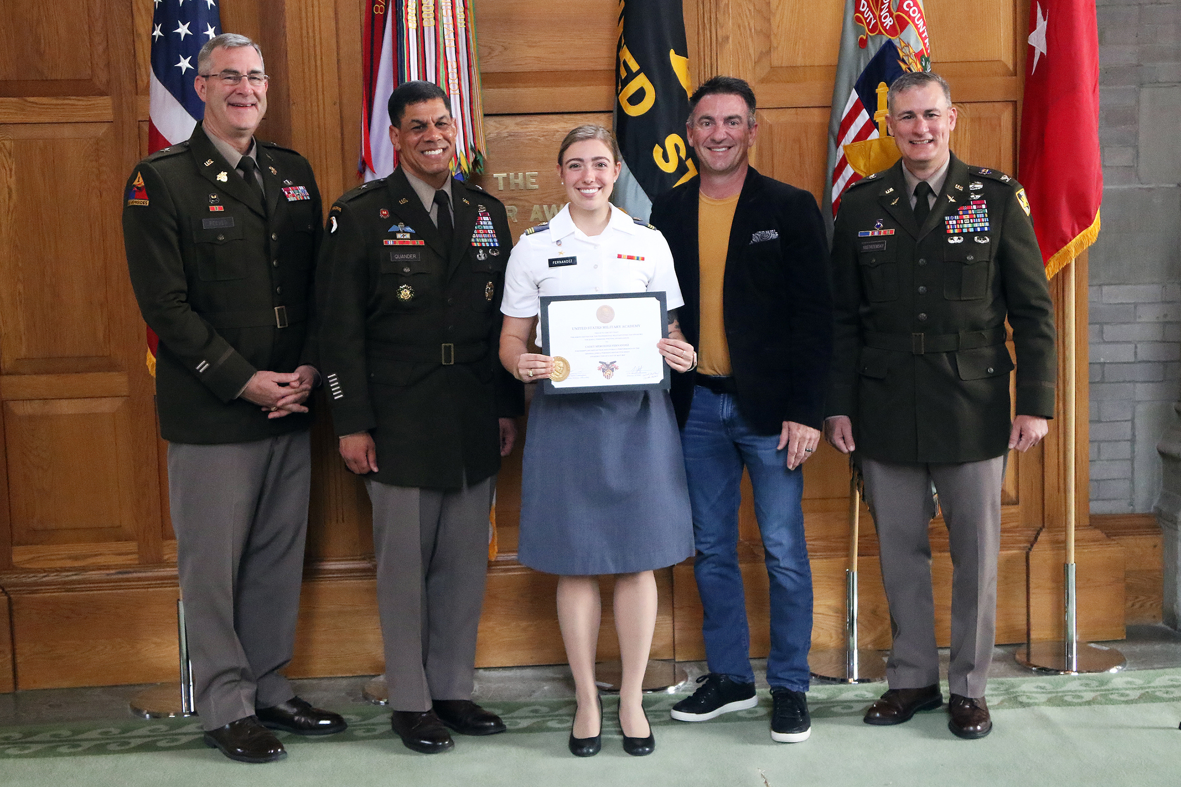 The Simon Center for the Professional Military Ethic (SCPME) hosted the 17th annual Gen. John J. Pershing Writing Award Ceremony May 24 at the Thayer Award Room. The award recognition ceremony acknowledged the top Firstie cadet awardees: Mercedez Fernandez (first place/gold medal), Jacob Lapin (second place/silver medal), Cora Haefner (third place/bronze medal) and honorable mention recipients Kelsie Edie and Anthony Marco III. Honorable mention awardee Shinkwang Moon was not present at the ceremony. 