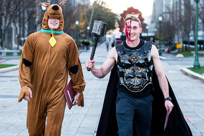Every semester, U.S. Military Academy cadets continue the tradition of the Social Sciences Run by finding creative, unusual and comedic ways of turning in their SOSH papers when they are due. On Monday, “panic-strickened” costumed cadets dashed, walked, carted, strolled or were carried in a parade of amusement before a cheering crowd of cadets through Central Area to their final destination at Lincoln Hall to meet their deadline. The SOSH paper, which is the signature writing assignment in the required 