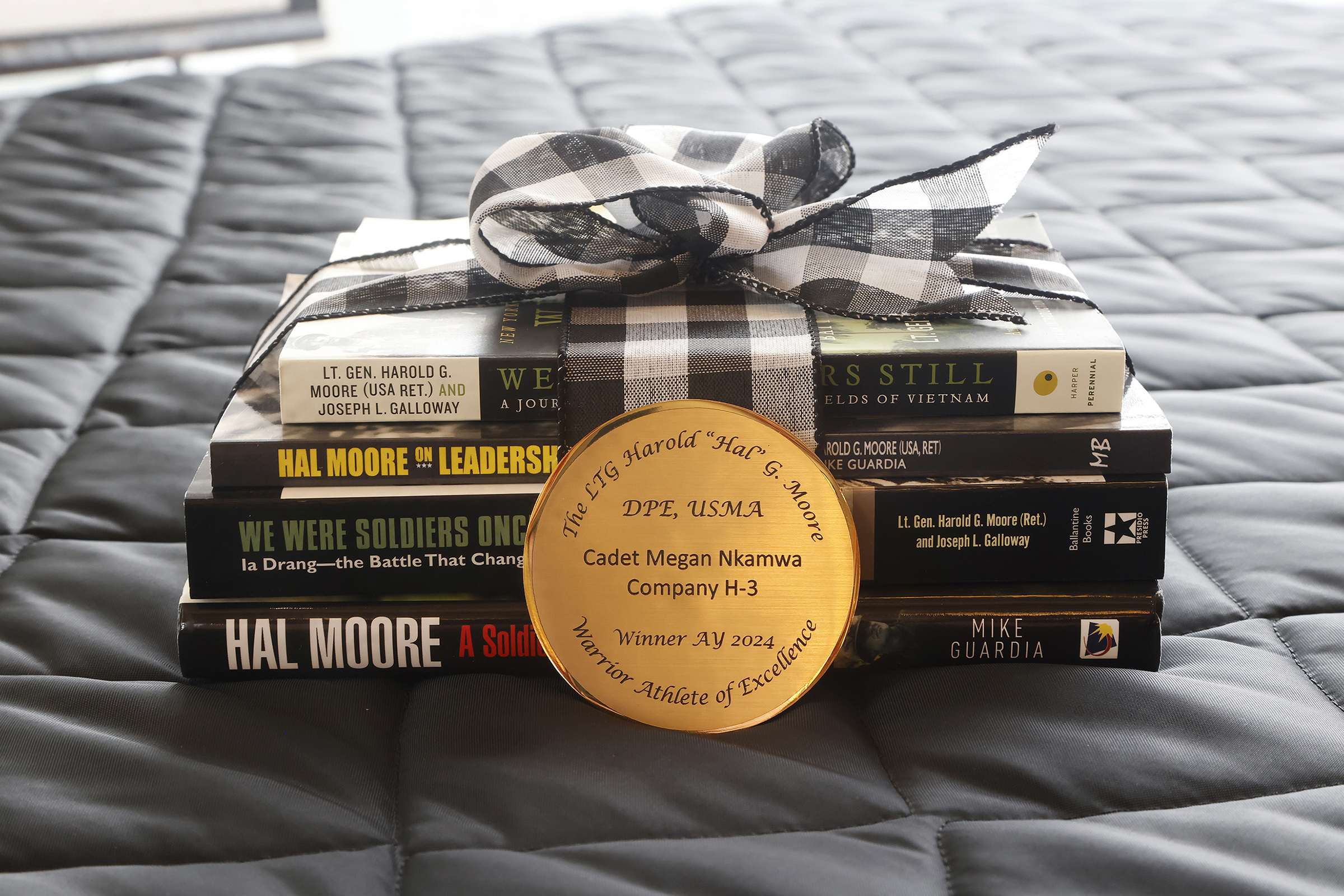 The Department of Physical Education hosted the 12th annual Lt. Gen. Harold “Hal” G. Moore Warrior Athlete of Excellence Award Nov. 9 in the Haig Room at Jefferson Hall. This year’s recipients of the award were Class of 2024 Cadets Tanner Craig and Megan Nkamwa. Craig competes with the Army West Point wrestling team and Nkamwa participates with the Army West Point boxing team. The award recognizes one male and one female first-class cadet each year.