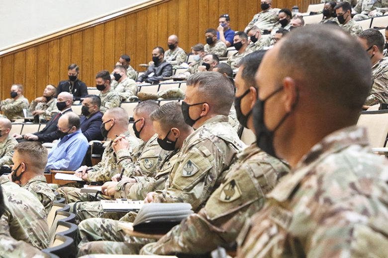 As part of the Commandant’s Speaker Series, the Modern War Institute hosted a panel discussion on “Building Cohesive Teams through Mutual Trust” on Oct. 21 at Washington Hall Room 5300. (Above) The panel was moderated by U.S. Corps of Cadets Command Sgt. Maj. Kenneth Killingsworth and the panel members included Command Sgts. Maj. Mario Terenas, Jake Love, Quentin Fenderson and Jill Crosby. (Right) Terenas answered questions on how he implements and upholds standards that help build and sustain any unit. 